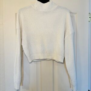 white cropped turtleneck sweater